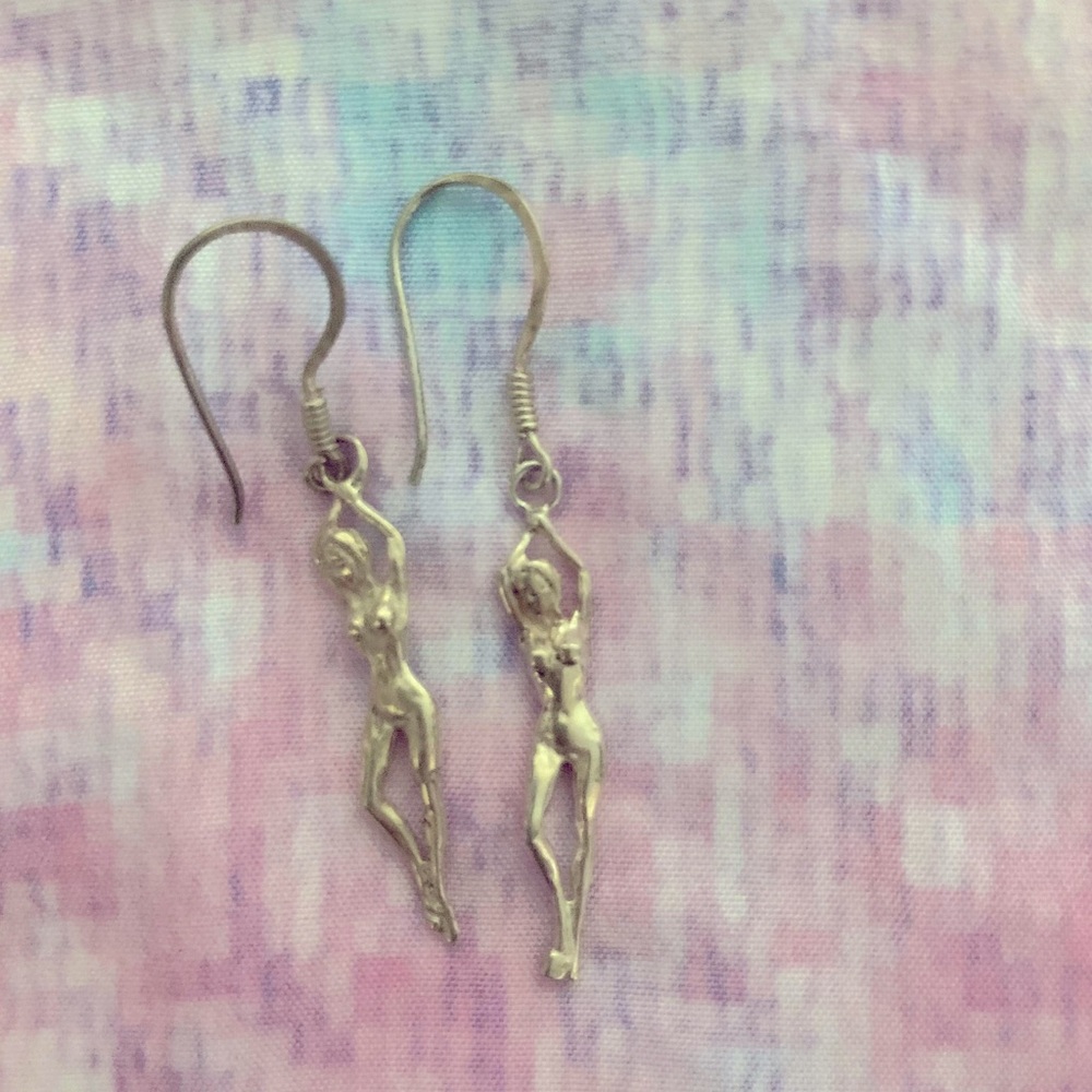 Female body earrings